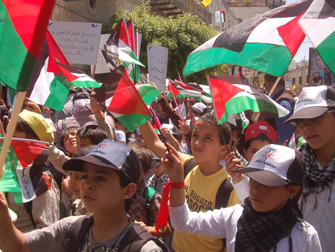 ‪الأطفال شاركوا في المظاهرات‬ (الجزيرة نت)