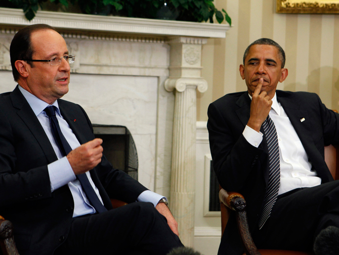 تحالف دولي ضعيف بشأن الضربة أبقى فقط على فرنسا بجانب الولايات المتحدة (رويترز)