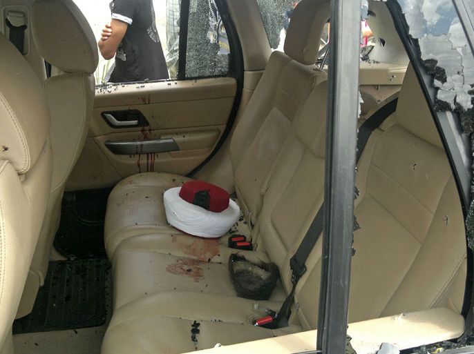 The turban of Lebanese Sunni cleric Ahmad Abdel Wahed lies on the blood-stained backseat of a car after army troops shot him dead when his convoy failed to stop at a checkpoint in the northern Lebanese town of Koueikhat on May 20, 2012. The incident took place following a week of intermittent clashes in the northern port city of Tripoli between Sunnis hostile to the Syrian regime and Alawites who support President Bashar al-Assad. AFP PHOTO/STR