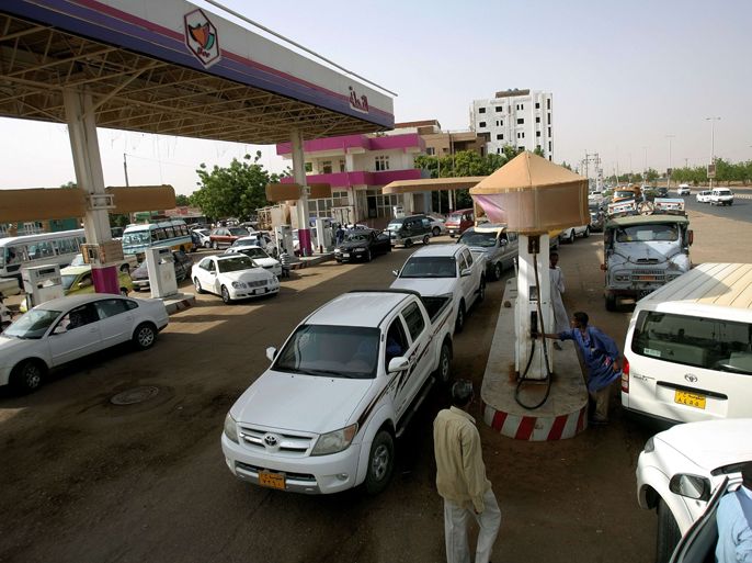 Sudanese queue in a petrol station to fuel their vehicles in the capital Khartoum on June 21, 2012. Sudan announced details of planned austerity measures contained in a new budget that are expected to save the government $1.5 billion in the face of ailing finances as economy is reeling, hit by soaring inflation and a rapidly depreciating currency, with the cash-scrapped government scrambling to make up for the heavy loss of oil revenues after the secession of the South last year. AFP
