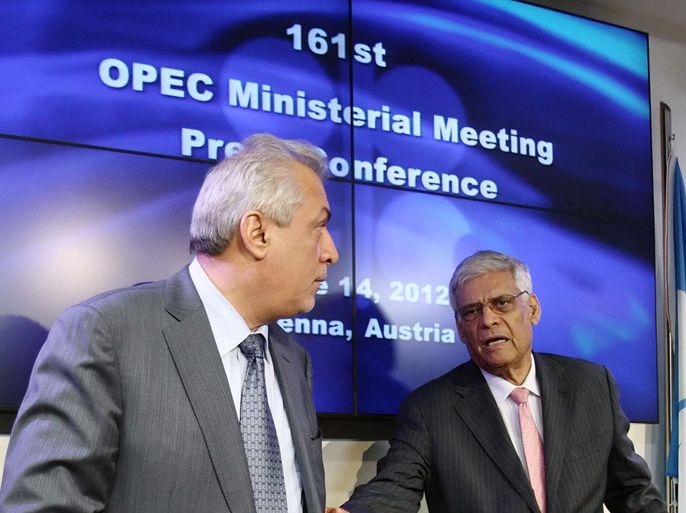 Iraq's Oil Minister and OPEC president Abdul Kareem Luaibi (L) and OPEC Secretary General Abdallah al-Badri leave a news conference after a meeting of OPEC oil ministers at OPEC's headquarters in Vienna, June 14, 2012. OPEC kept oil output limits on hold on Thursday at 30 million barrels a day, powerless to do anything other than hope top producer Saudi Arabia will scale back supplies unilaterally soon to stem a $30 slide in prices. REUTERS/Heinz-Peter Bader (AUSTRIA - Tags: POLITICS ENERGY)