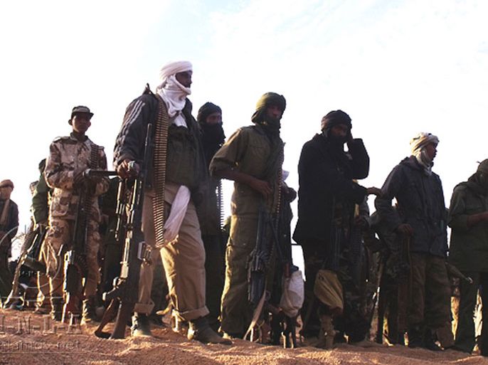 MALI : A handout picture released by the Mouvement national pour la libération de l'Azawad (Azawad National Liberation Movement - MLNA) on April 2, 2012 and taken in February 2012 reportedly shows MNLA fighters gathering in an undisclosed location in Mali. Islamist and Tuareg rebels clashed in the key town of Gao in Mali's occupied north, leaving at least 20 people dead, witnesses said on June 27, 2012.