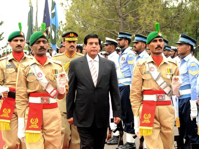 This handout photograph released by Pakistan's Press Information Department (PID) on June 23, 2012 shows newly elected Pakistan's Prime Minister Raja Pervez Ashraf (C) inspects a guard of honour during a welcoming ceremony at the Prime Minister House in Islamabad. MPs elected Raja Pervez Ashraf as Pakistan's new prime minister in a bid to end a crisis sparked by judges ousting the premier and demanding the arrest of his would-be successor. AFP