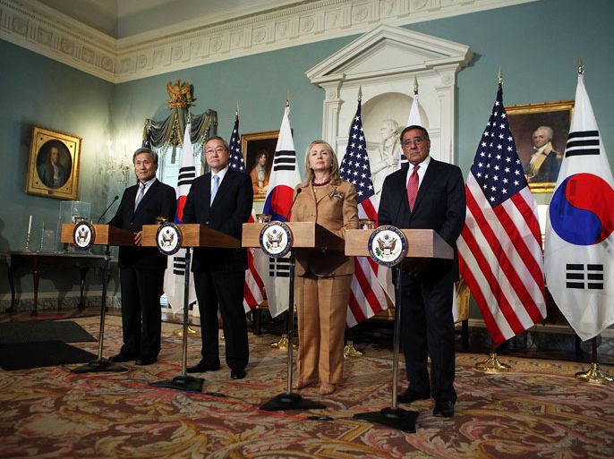 U.S. Secretary of State Hillary Clinton (3rd L), U.S. Secretary of Defense Leon Panetta (R), South Korean Minister of Foreign Affairs and Trade Kim Sung-Hwan (2nd L), and South Korean Minister of National Defense Kim Kwan-Jin (L) participate in a joint news conference June 14, 2012 at the State Department in Washington, DC. Clinton and Panetta met with their South Korean counterparts for the U.S.-Korea ministerial dialogue 2+2 meetings and had talks on bilateral, regional, and global issues. Alex Wong/Getty Images/AFP== FOR NEWSPAPERS, INTERNET, TELCOS & TELEVISION USE ONLY ==
