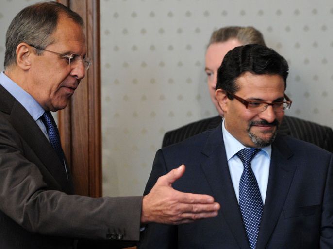 Moscow, -, RUSSIAN FEDERATION : Russia's Foreign Minister Sergei Lavrov (L) invites his visiting Tunisian counterpart Rafik Abdessalem to take a seat during their meeting in Moscow, on June 28, 2012. Lavrov said today it was a mistake to exclude Iran from weekend talks in Geneva on the crisis in Syria, accusing the United States of "double standards" on the issue. AFP PHOTO / KIRILL KUDRYAVTSEV