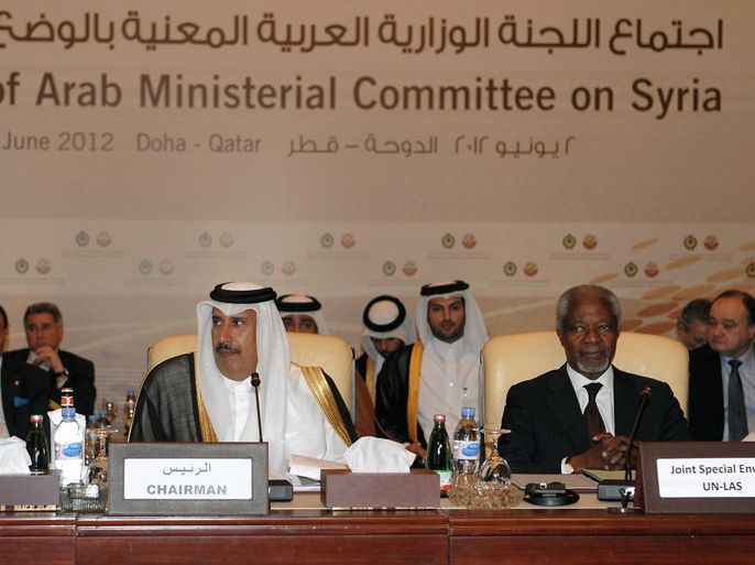 Qatari Prime Minister and Foreign Minister Sheikh Hamad bin Jassem al-Thani and UN-Arab League envoy to Syria Kofi Annan attend an Arab ministerial committee meeting in Doha to discuss the Syrian crisis on June 2, 2012. Qatar urged Annan to set a timeframe for his Syria peace mission, and asked the UN Security Council to apply Chapter VII which permits military intervention. AFP PHOTO/KARIM JAAFAR