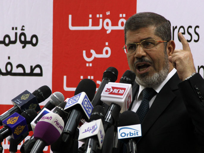 ‪مرسي: لو حدث تزوير فإن النتيجة ثورة عارمة على المجرمين‬ مرسي: لو حدث تزوير فإن النتيجة ثورة عارمة على المجرمين (الفرنسية)