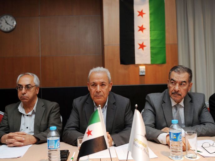 Leaders of the exiled Syrian National Council (SNC), Muhammet Faruq Tayfur (R), Burhan Ghalioun (C) and Abdel Basset Sayda (L), wait on June 9, 2012 before the start of a meeting in Istanbul to pick a new leader after the resignation of Ghalioun last month to avert divisions in the opposition bloc. SNC sources said the aim was to pick a "consensus" candidate who would be acceptable to Islamists, liberals and nationalists. They said that could be Abdel Basset Sayda, a Kurd, and member of the SNC's executive office. Sayda lives in exile in Sweden. AFP PHOTO