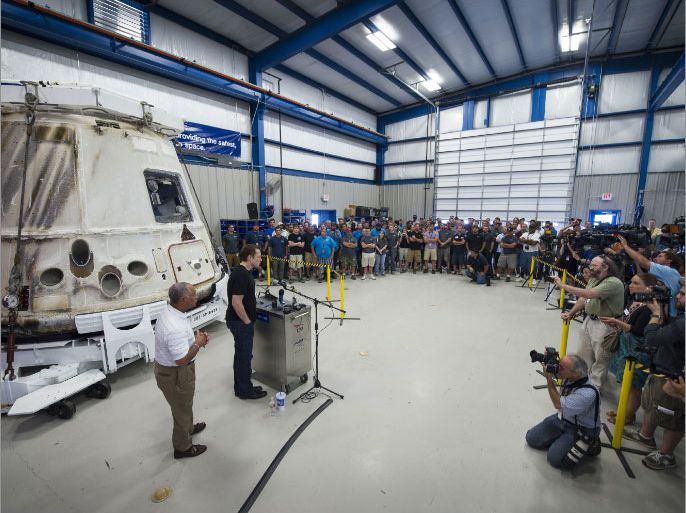 This NASA photo shows NASA Administrator Charles Bolden(L), and SpaceX CEO and Chief Designer Elon Musk, as they view the historic Dragon capsule that returned to Earth on May 31 following the first successful mission by a private company to carry supplies to the International Space Station on June 13, 2012 at the SpaceX facility in McGregor, Texas. Bolden and Musk also thanked the more than 150 SpaceX employees working at the McGregor facility for their role in the historic mission. AFP PHOTO/NASA/BILL INGALLS/HANDOUT/RESTRICTED TO EDITORIAL USE - MANDATORY CREDIT " AFP PHOTO / - NO MARKETING NO ADVERTISING CAMPAIGNS - DISTRIBUTED AS A SERVICE TO CLIENTS