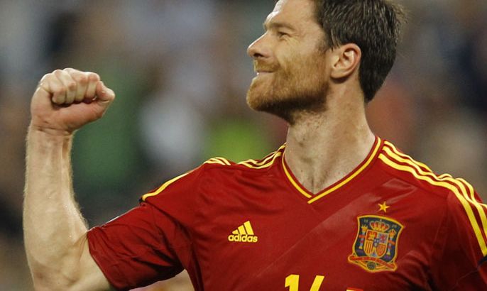 epa03278936 Xabi Alonso of Spain celebrates after scoring the 2:0 with a penalty during the quarter final match of the UEFA EURO 2012 between Spain and France in Donetsk, Ukraine, 23 June 2012. EPA/ROBERT GHEMENT UEFA Terms and Conditions apply http://www.epa.eu/downloads/UEFA-EURO2012-TCS.pdf