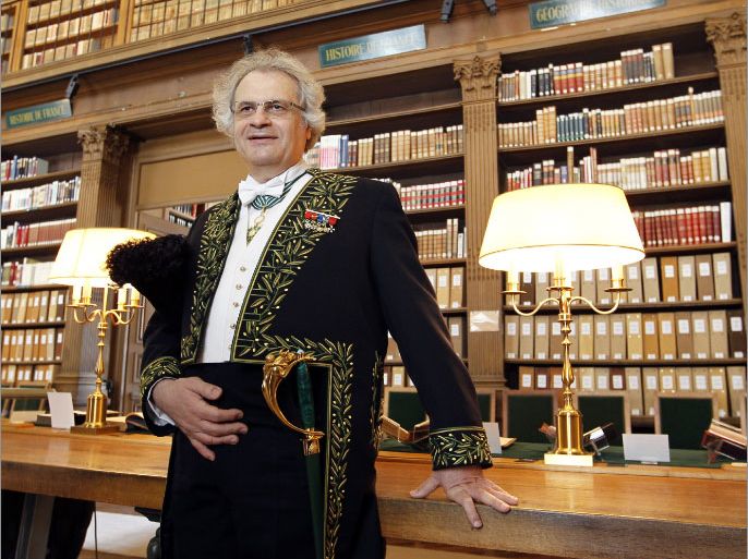 French-Lebanese writer Amin Maalouf, a new member of the Academie Francaise (French Academy, part of the Institut de France) delivers a speech on June 14, 2012 at the Institut de France in Paris during a ceremony to mark his new membership in the institution. Maalouf, 63, dressed in the Academie Francaise's members' traditional green uniform, joined the "immortals", the term used to designate the 40 members of the Academie. Maalouf has published several novels that focus on the themes of Arab religious and national identity, in addition to journalism articles, essays and works of history. AFP PHOTO / FRANCOIS GUILLOT