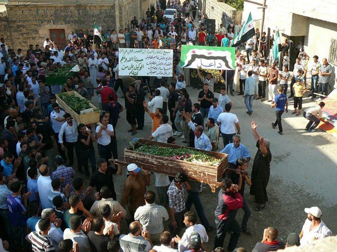 A handout picture released by the Syrian opposition's Shaam News Network on July 19, 2012 shows Syrian mourners carrying the coffins of victims killed in violence in Dael in the southern province of Daraa on July 18, 2012. Syria is not on track for peace and violence is escalating, the chief of the UN monitoring group Major General Robert Mood said on July 19, as clashes rocked Damascus and a day after three top regime officials died in a bombing. AFP