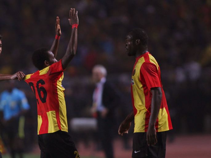 Esperance Tunis forward Harisson Afful (C) celebrates with his teammates after scoring the winning goal against Wydad Casablanca during the CAF Champions League soccer final at the Rades Olympic stadium in Tunis, Tunisia, 12 November 2011. Esperance won 1-0. EPA/STRINGER