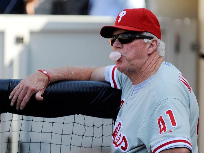 Philadelphia Phillies manager Charlie Manuel blows a chewing gum bubble in the 9th inning against the San Diego Padres in San Diego, California USA 28 August 2010. The Phillies defeated the Padres 3-1. EPA/MIKE NELSON