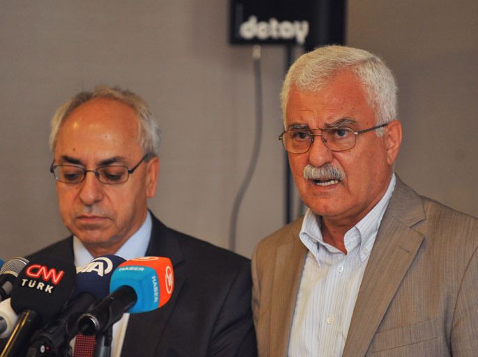 KLC1086 - Istanbul, Istanbul, TURKEY : Syrian opposition member George Sabra(R) attends a press a meeting with a leader of the Syrian National Council (SNC), Abdel Basset Sayda(L) in Istanbul on July 13, 2012. UN mission chief Major General Robert Mood in Damascus on July 12, 2012 said the observers from the UN Supervision Mission in Syria (UNSMIS) are ready to go to the central village of Treimsa, site of a reported massacre of more than 150 people. AFP PHOTO/BULENT KILIC