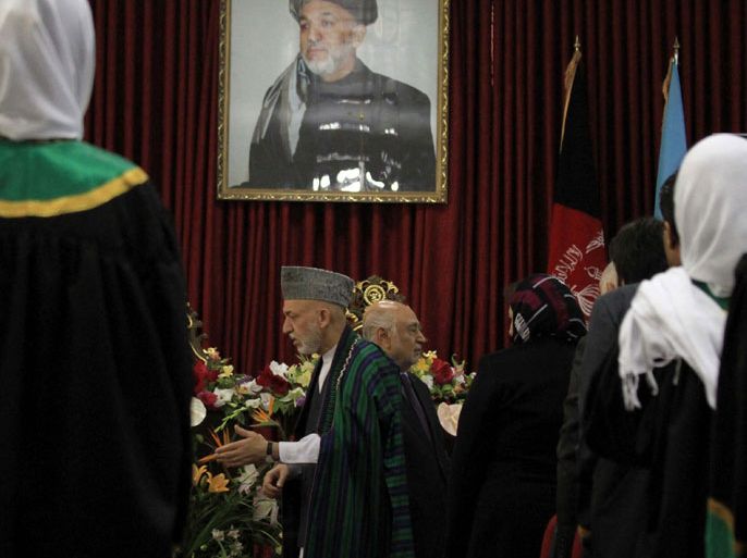 Afghan President Hamid Karzai (C) attends a first gathering of the Women Judges Association in Kabul, Afghanistan, 18 July 2012. EPA