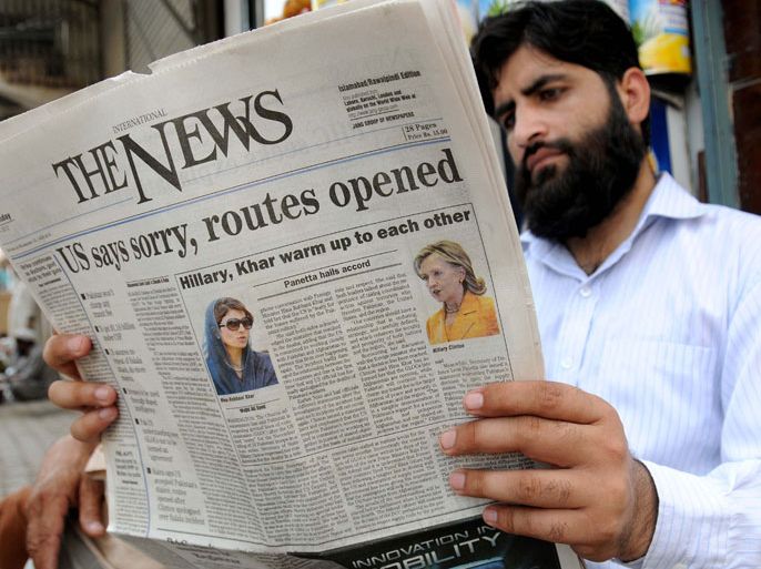 A local reads the news of Pakistan agreement to reopen NATO supply news, at a local newspaper stall in Peshawar, Pakistan, 04 July 2012. Pakistan has agreed to reopen NATO ground supply routes into Afghanistan, after closing them in protest at 24 Pakistani soldiers having been killed in an airstrike on 2011, US Secretary of State Hillary Clinton, said on 03 July. Clinton apologized to Pakistan for the deadly airstrike along the border with Afghanistan, in a telephone call to Foreign Minister Hina Rabbani Khar. The issue of an apology had proved a major roadblock in attempts to reach agreement on reopening the routes and had further soured relations between the countries. EPA/ARSHAD ARBAB