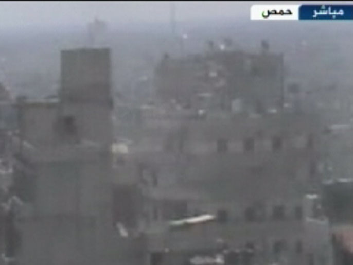 النظام السوري اتهم بإلقاء قنابل كيمياوية على بعض المناطق (الجزيرة)