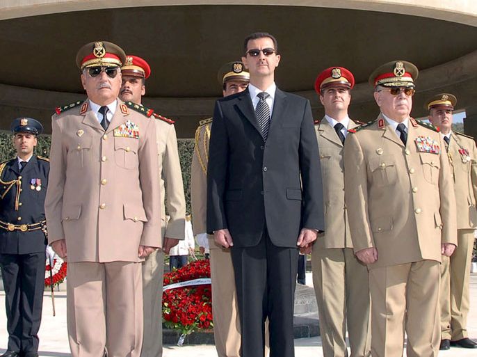 epa03310155 (FILE) A handout file photo dated 06 October 2007 released by the Syrian Arab News Agency (SANA) shows Syrian President Bashar Assad (C), Minister of Defence General Hassan Turkmani (R) and General Ali Habib chief of staff at the Unknown martyr tomb near Damascus, Syria. Syrian state television said on 18 July 2012 that assistant vice president and former defence minister, Hassan Turkmani died of injuries sustained in the explosion that hit a government security building in Damascus. Syrian Defence Minister Daoud Rajha and his deputy Assef Shawkat - the brother-in-law of President Bashar al-Assad - were also killed in the blast. EPA/SANA HANDOUT HANDOUT EDITORIAL USE ONLY/NO SALES