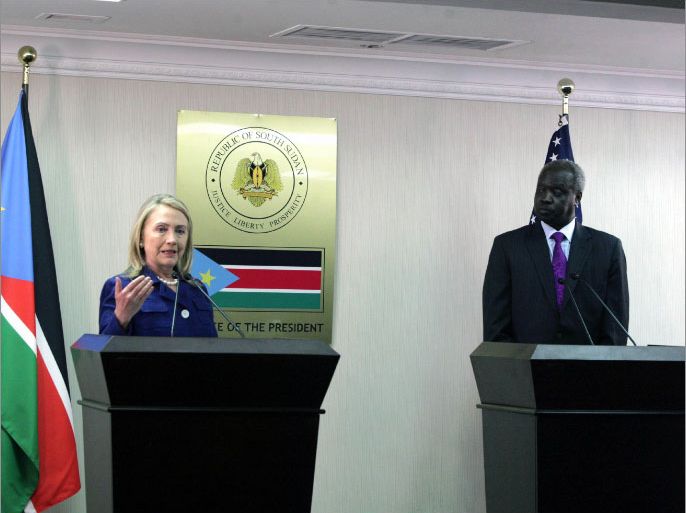 epa03337127 US Secretary of State Hillary Clinton (L) speaks during a press conference with South Sudanese Foreign Minister Nhial Deng Nhial (R) in Juba, South Sudan, 03 August 2012. Secretary Clinton arrived in Juba early 03 August as part of her African tour, during which she is visiting Uganda, Kenya, South Sudan, Malawi, Nigeria, Benin and South Africa to promote the United States strategy in regards to Sub-Saharan Africa.  EPA/PHILIP DHIL