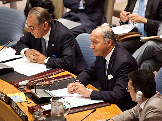 NEW YORK, NY - AUGUST 30: Laurent Fabius (C), minister for Foreign Affairs of France and president of the United Nations (UN) Security Council, attends a UN Security Council meeting regarding the on-going situation in Syria on August 30, 2012 in New York City. UN Security Council negotiations regarding the situation in Syria collapsed last month. Andrew Burton/Getty Images/AFP== FOR NEWSPAPERS, INTERNET, TELCOS & TELEVISION USE ONLY ==