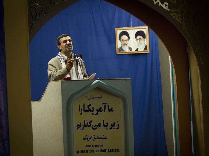 Iranian President Mahmoud Ahmadinejad delivers a speech at the podium of the Friday prayer in Tehran University during the "Quds Day" rally, an anti Israeli demonstration in solidarity with Palestinians in Tehran on August 17, 2012. Ahmadinejad said that Israel is a "cancerous tumour"
