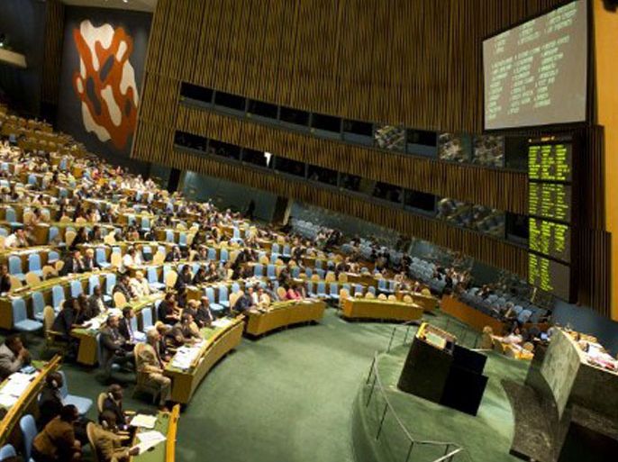 Delegates vote during the United Nations General Assembly meeting on Syria August 3, 2012 at the United Nations in New York. The UN General Assembly overwhelmingly passed a resolution Friday criticizing the Security Council's failure to act on the Syria conflict, which UN leader Ban Ki-moon said has become a "proxy war