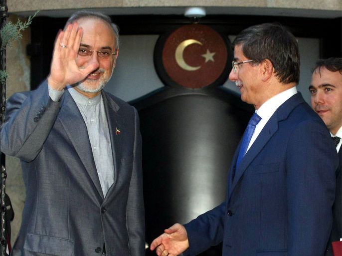 Ankara, Ankara, TURKEY : Iranian Foreign Minister Ali Akbar Salehi (L) and his Turkish counterpart Ahmet Davutoglu pose for a photo before a meeting in Ankara, on August 7, 2012.