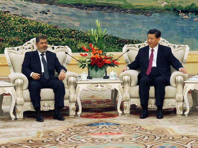 Egypt's President Mohamed Mursi meets with China's Vice President Xi Jinping (R) in the Great Hall of the People, in Beijing August 29, 2012. Mursi is in China on a three-day visit before heading to Iran to attend the Non-Aligned Movement meetings in Tehran on August 30,
