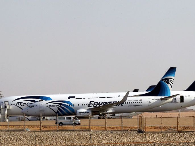 epa03388239 Planes of Egypt's state-owned carrier, EgyptAir, sit on a runway at Cairo Airport, Cairo, Egypt, 07 September 2012. Media reports quoting company official state that EgyptAir on 07 September recruited emergency attendants and resumed some international flights after a strike by its crews forced many flight cancellations. The strike has grounded more than 40 long-haul flights since it started at midnight, sources in the airline said. EPA/KHALED ELFIQI