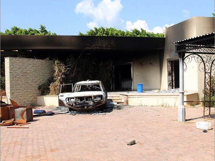 A burnt house and a car are seen inside the US Embassy compound on September 12, 2012 in Benghazi, Libya following an overnight attack on the building. The US ambassador to Libya and three of his colleagues were killed in an attack on the US consulate in the eastern Libyan city by Islamists outraged over an amateur American-made Internet video mocking Islam, less than six months after being appointed to his post. AFP PHOTO/STRINGER