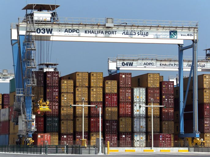 KS039 - Abu Dhabi, -, UNITED ARAB EMIRATES : A picture shows containers at the new Khalifa Port in Abu Dhabi on September 1, 2012. Oil-rich Abu Dhabi began commercial operations at its new Khalifa Port which cost so far $7.2 billion to take over from its 40-year-old Mina Zayed Port as a container terminal. AFP PHOTO/KARIM SAHIB