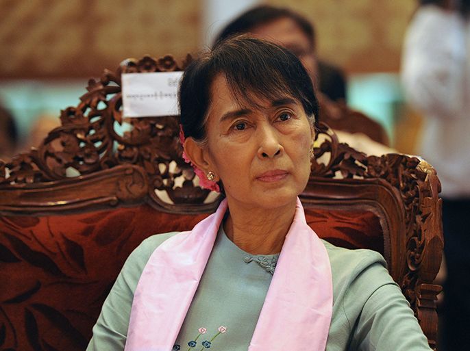 Myanmar opposition leader and head of the parliamentary committee on Rule of Law and Stability Aung San Suu Kyi attends a meeting of the committee at the Yangon Division Parliament in Yangon on September 8, 2012. Suu Kyi will travel to the US on September 16, a spokesman for her party said, where she will be awarded Washington's highest honour. AFP