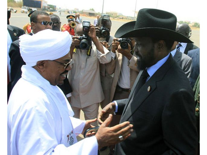 A file photo dated 08 October 2011 shows Sudanese president Omar Al-Bashir (L) welcoming the President of South Sudan, Salva Kiir Mayardit (R), in Khartoum, Sudan. The African Union (AU) has urged Sudan and its seceded neighbour South Sudan on 22 September 2012 to reach a final deal on all remaining areas of dispute at a summit to take place in the Ethiopian capital Addis Ababa on 23 September 2012. The meeting between Sudan's president Omar al-Bashir and his South Sudanese counterpart Salva Kiir comes a day after the expiration of a United Nations Security Council deadline for the conclusion of negotiations. The UN has threatened non-military sanctions should a deal not be reached. The two countries came close to war in April when they fought over the oil-rich Abyei region, which lies along their shared border. EPA/ASHRAF SHAZLY