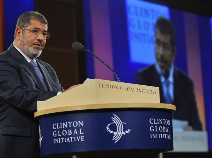 NYSC16 - New York, New York, UNITED STATES : President Mohamed Morsi of Egypt speaks during the 2012 Clinton Global Initiative annual meeting September 25, 2012 in New York. AFP PHOTO STEPHEN CHERNIN