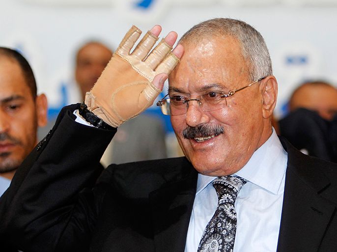 Yemen's former President Ali Abdullah Saleh gestures at supporters during a ceremony marking the 30th anniversary of the establishment of the General People's Congress party, which he is leading, in Sanaa September 3, 2012. Saleh stepped down in February after more than a year of countrywide protests demanding his resignation. REUTERS