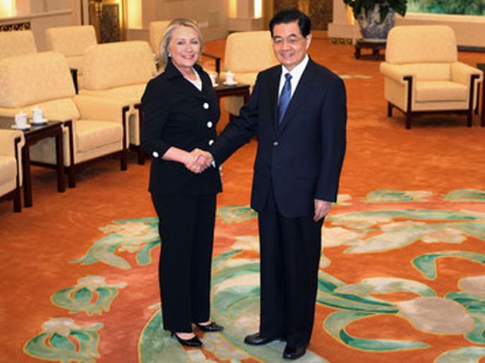 Chinese President Hu Jintao (R) and US Secretary of State Hillary Clinton (L) shake hands at the Great Hall of the People in Beijing, China, 05 September 2012. EPA/FENG LI / POOL