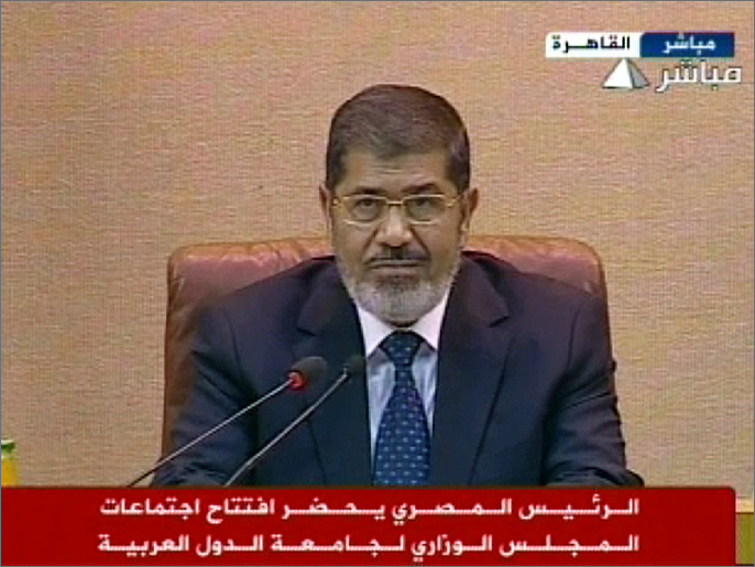 ‪محمد مرسي دعا النظام السوري إلى الرحيل‬ (الجزيرة)