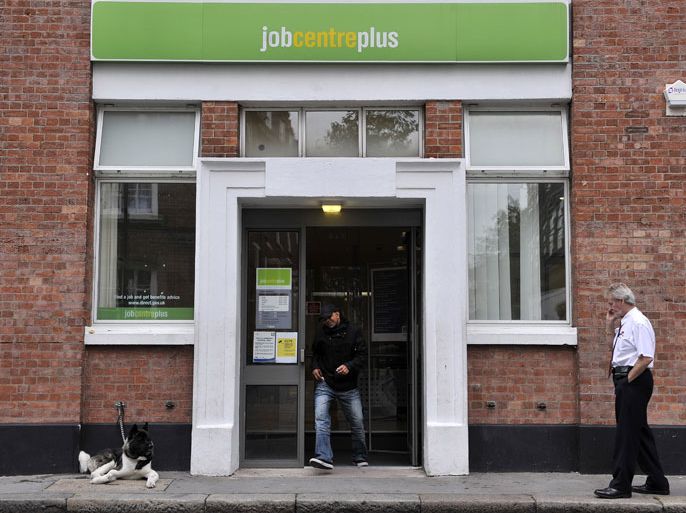 epa02963536 A job seeker exits a Job Centre in London, Britain, 12 October 2011. British unemployment rose to 2.57 million, a 17-year high, while the number of young people without jobs reached a record high, according to official figures released 12 October. The Office for National Statistics (ONS) said unemployment has also increased to 8.1 per cent. The jobless total for 16 to 24-year-olds hit a record high of 991,000 in the last three months. EPA/ANDY RAIN
