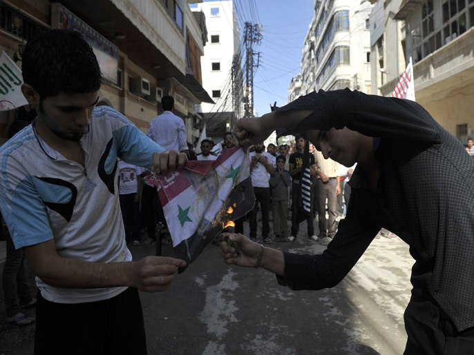 ‪حلب شهدت أمس مظاهرة طالب فيها المشاركون بنصرة الجيش الحر‬  (الفرنسية)