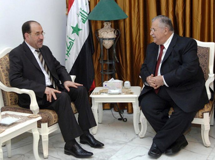 Iraqi President Jalal Talabani (R) talks with his Prime Minister Nouri al-Maliki during their meeting in Baghdad on 11 June 2007. EPA/STRINGER
