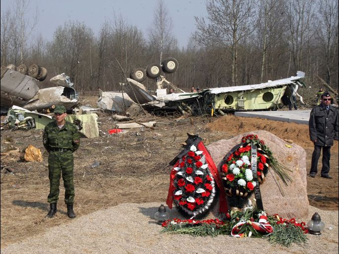 epa03452043 (FILE) A file photo dated 13 April 2010 shows Russian soldiers standing in line around wreckage of a Polish government Tupolev Tu-154 plane that crashed near Smolensk airport, Russia. All people aboard the plane including Polish President Lech Kaczynski and his wife Maria Kaczynska were killed in the crash. Polish forensic experts have found traces of explosives on the wreckage of the plane that crashed in Russia in 2010 and killed President Lech Kaczynski and 95 others, the daily Rzeczpospolita reported 30 October 2012 without citing sources. Traces of TNT and nitroglycerin were found on up to 30 seats inside the plane, the daily reported. Traces of explosives were also found on the wings, and in the area where the plane crashed in Smolensk, Russia on April 10, 2010, the daily said. The experts were unable to say how the traces of explosives got onto the plane. One theory says the explosive traces came from bombs from the World War II era that still remain in the Smolensk area. EPA/SERGEI CHIRIKOV