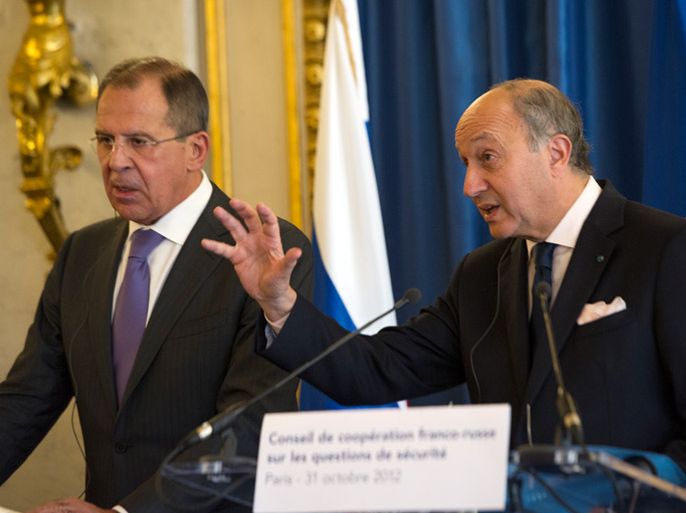 epa/ French Foreign Affairs Minister, Laurent Fabius, speaks during a joint press conference with his Russian counterpart, Sergey Lavrov (L), at the Quai d'Orsay in Paris