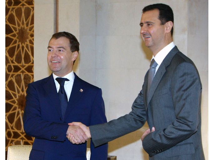 Russian President Dmitry Medvedev (L) shakes hands with Syrian President Bashar Assad (R), during their meeting in Damascus, Syria, 11 May 2010. Russia and Syria plan to set up a council for strategic interaction, Syrian President Bashar Assad announced