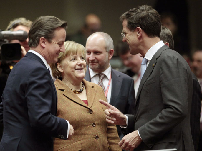 epa03482735 (L TO R) British Prime Minister David Cameron Germany Federal Chancellor Angela Merkel and Dutch prime Minister Mark Rutte at the start of a European summit at the EU headquarters in Brussels, Belgium, 22 November 2012. Heads of State and Government will discuss the EU budget, the euro and the