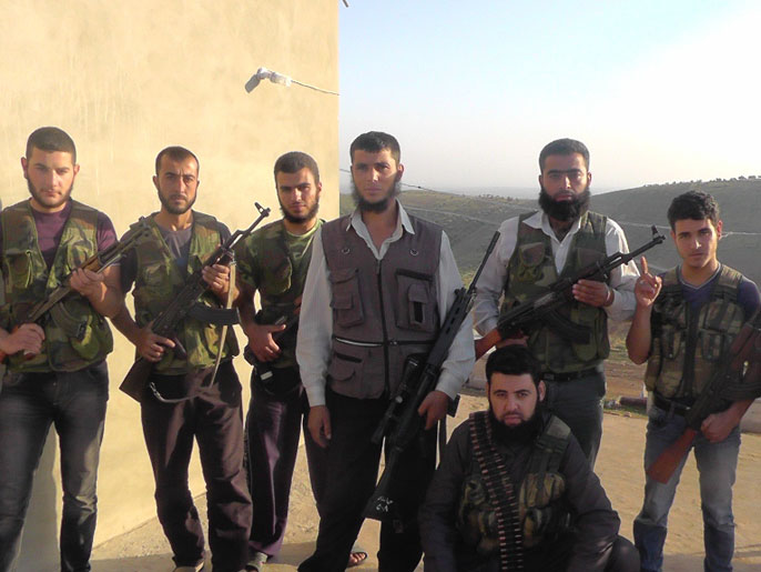 عدد من مقاتلي كتائب أحرار الشام في سوريا (الجزيرة-أرشيف)