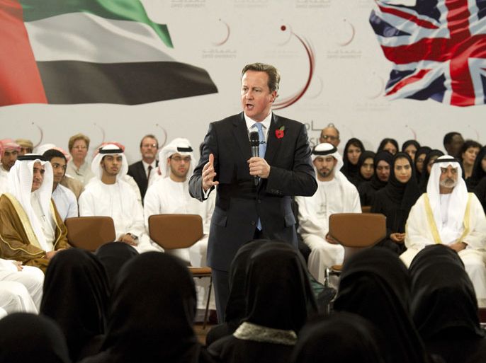 epa03459004 A handout picture released by Emirates News Agency (WAM) shows British Prime Minister David Cameron (C) speaking to students at Zayed University in Abu Dhabi, United Arab Emirates on 05 November 2012. Cameron has began a three-day visit to the Gulf and Middle East region. EPA/WAM HANDOUT HANDOUT EDITORIAL USE ONLY/NO SALES