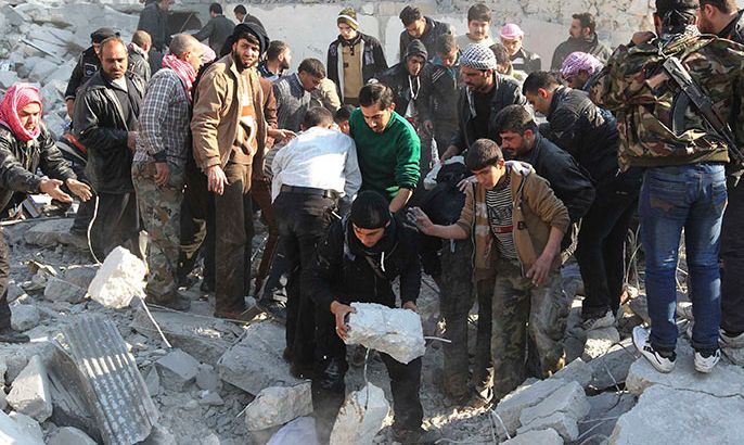 Free Syrian Army fighters and civilians search for bodies under rubble after an air strike by a fighter jet loyal to Syrian President Bashar al-Assad in Aleppo's al-Marja district December 31, 2012. REUTERS/Muzaffar Salman (SYRIA - Tags: CONFLICT CIVIL UNREST POLITICS)