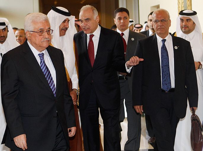 r : Palestinian President Mahmoud Abbas (L) arrives to the Arab Peace Initiative Committee Meeting in Doha December 9, 2012. REUTERS/Mohammed Dabbous (QATAR - Tags: POLITICS)