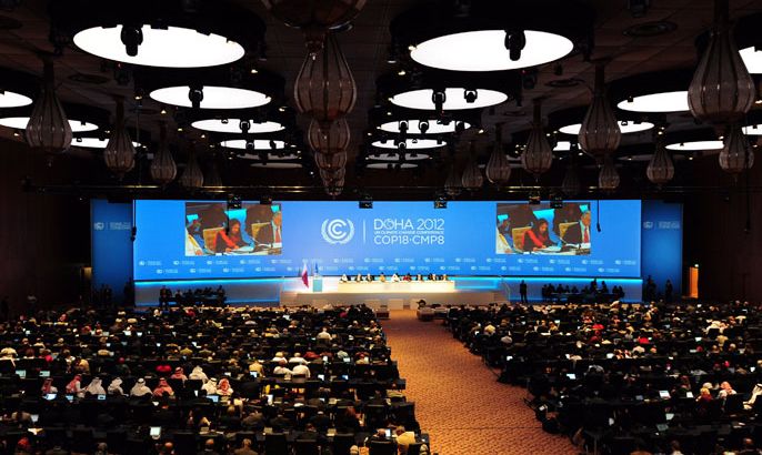 epa03486991 A general view shows the opening ceremony of the Sessions of the 18th Conference of the Parties (COP18) to the UN Framework Convention on Climate Change (UNFCCC) and the 8th Meeting of the Parties to the Kyoto Protocol (CMP8), at the National Convention Centre, Doha, Qatar, 26 November 2012 The 18th global climate change conference opened in Qatar on